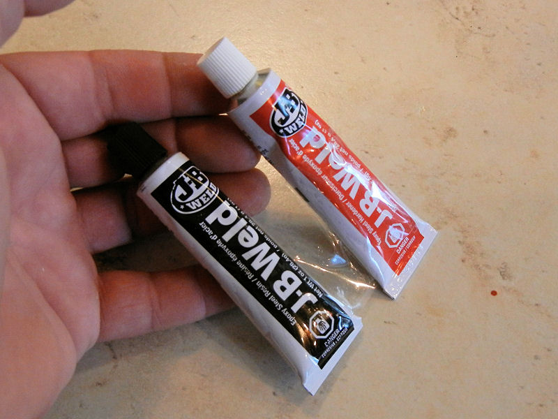Two part epoxy tubes taped together.